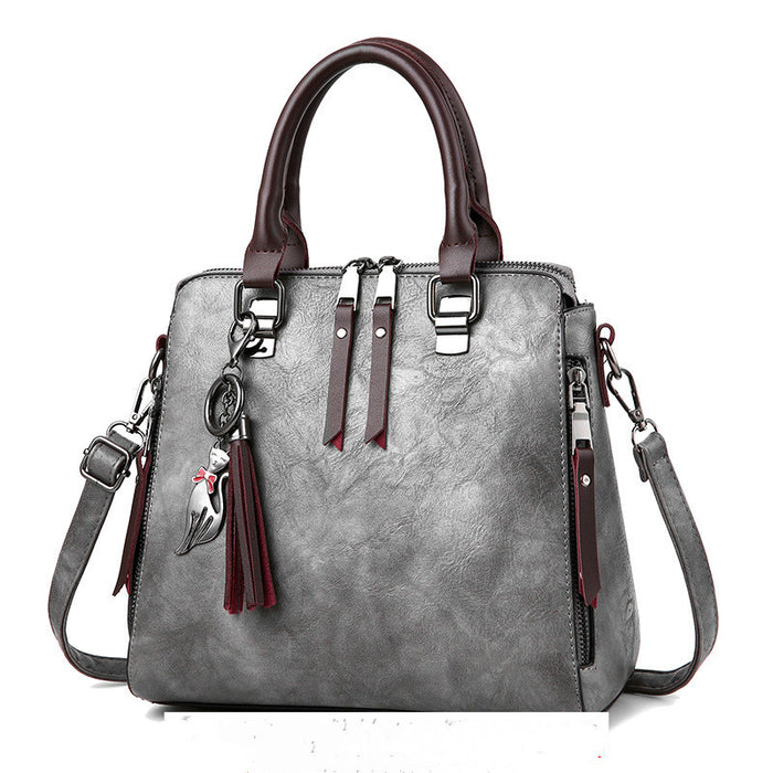Riley | Vintage Top Handle Purse with Tassel and Shoulder Strap