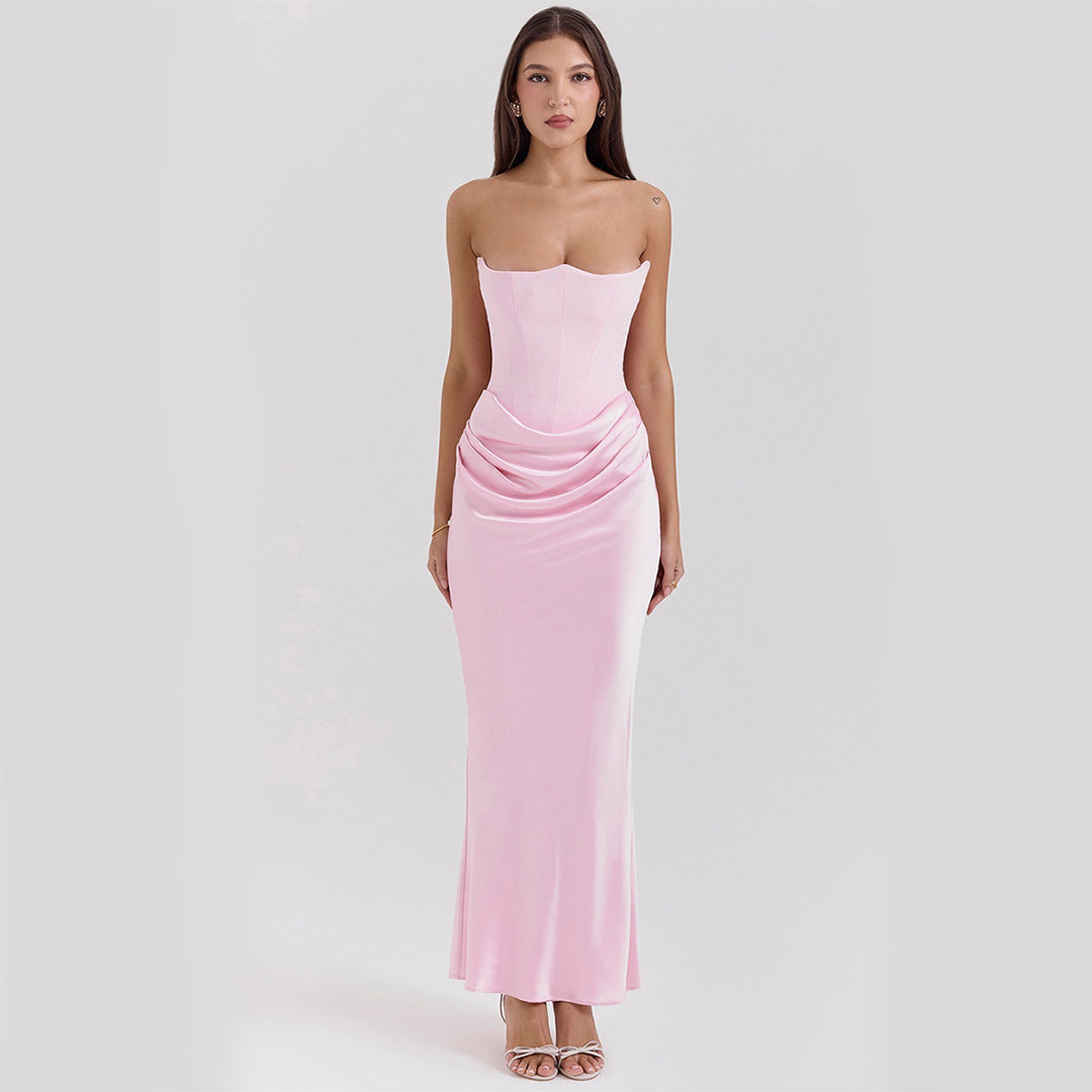 Woman in a strapless satin maxi gown