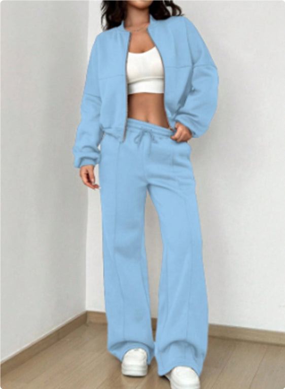 Woman in a zip jacket and wide-leg pants set