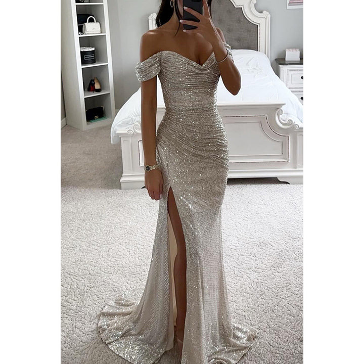 Woman in long off-shoulder sequin evening dress