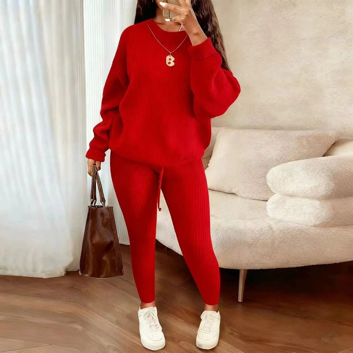 Woman in matching ribbed knit sweater and pants set