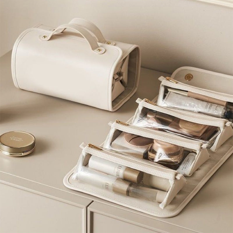 Cream toiletry bag with clear pouches